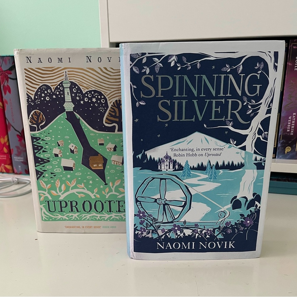 OOP UK Hardcovers of Uprooted and Spinning Silver by Naomi Novik